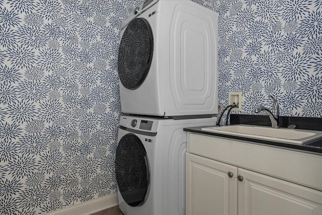 1111 Seneca Rd, Wilmette, IL 60091 - laundry room with estacked washer and dryer and wallpapered walls