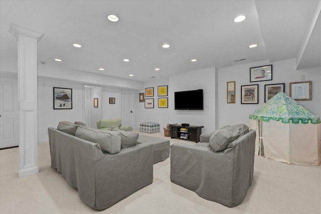 1111 Seneca Rd, Wilmette, IL 60091 - living area featuring ornate columns, recessed lighting, and light carpet