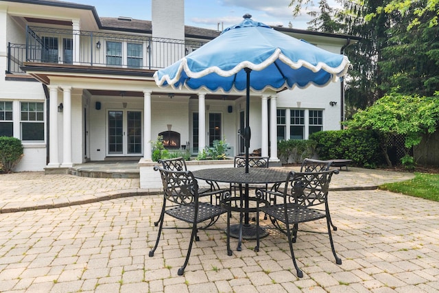 1111 Seneca Rd, Wilmette, IL 60091 - patio / terrace featuring a patio area, outdoor dining area, and french doors