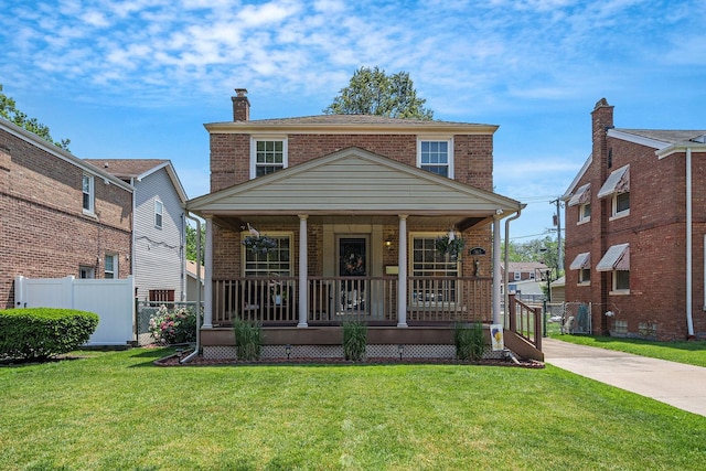 7805 W Farragut Ave, Chicago, IL 60656 - view of front of house featuring brick siding, a porch, and a chimney
