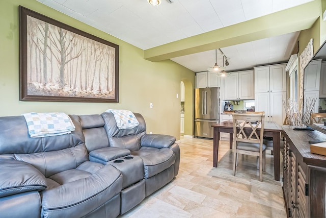 7805 W Farragut Ave, Chicago, IL 60656 - living room featuring arched walkways and track lighting