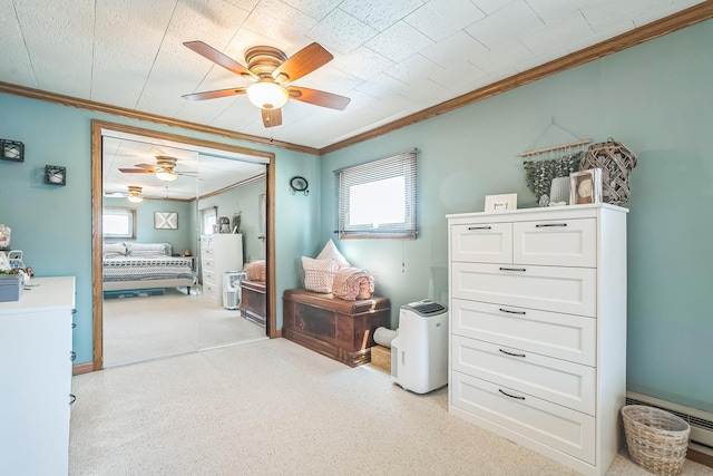 7805 W Farragut Ave, Chicago, IL 60656 - living area featuring ornamental molding, ceiling fan, carpet, and a baseboard heating unit