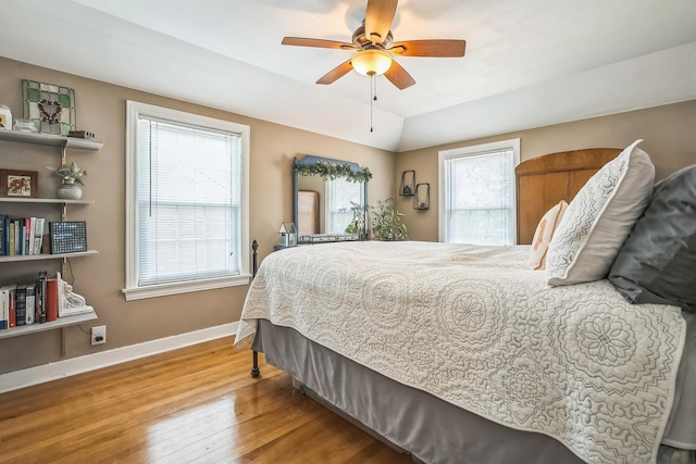 7805 W Farragut Ave, Chicago, IL 60656 - bedroom featuring wood finished floors, a ceiling fan, and lofted ceiling