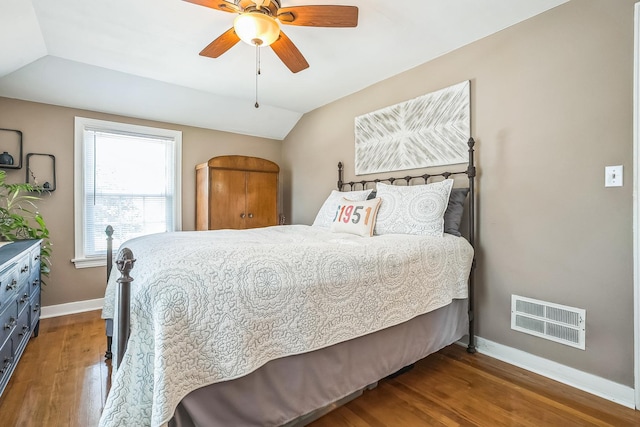 7805 W Farragut Ave, Chicago, IL 60656 - bedroom featuring wood finished floors, lofted ceiling, and ceiling fan