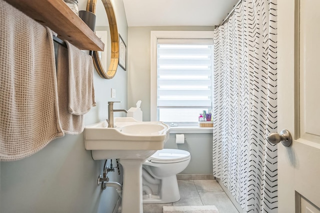 7805 W Farragut Ave, Chicago, IL 60656 - bathroom with plenty of natural light and tile patterned floors