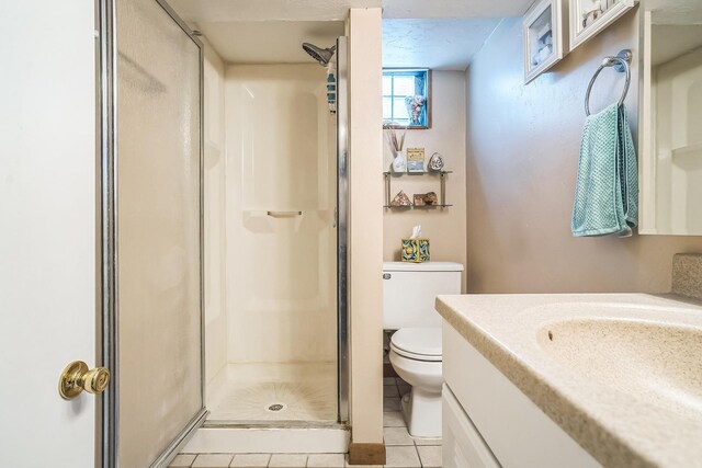 7805 W Farragut Ave, Chicago, IL 60656 - full bathroom with tile patterned flooring, vanity, and a shower stall