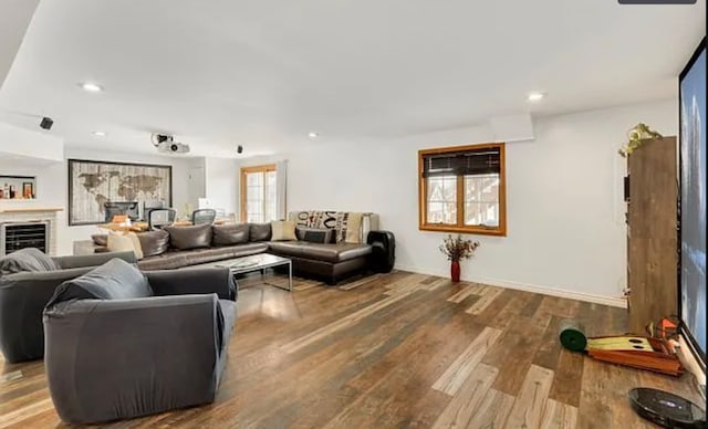 14867 Steven Ct, Lemont, IL 60439 - living room featuring wood finished floors, recessed lighting, and a fireplace