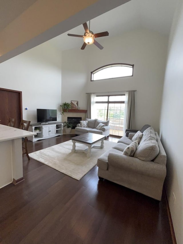 14867 Steven Ct, Lemont, IL 60439 - living room featuring high vaulted ceiling, dark wood finished floors, ceiling fan, and a fireplace