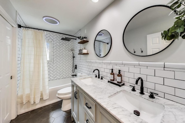 115 Circle Dr W, Montgomery, IL 60538 - bathroom featuring shower / bath combo with shower curtain, tile walls, double vanity, and tile patterned flooring
