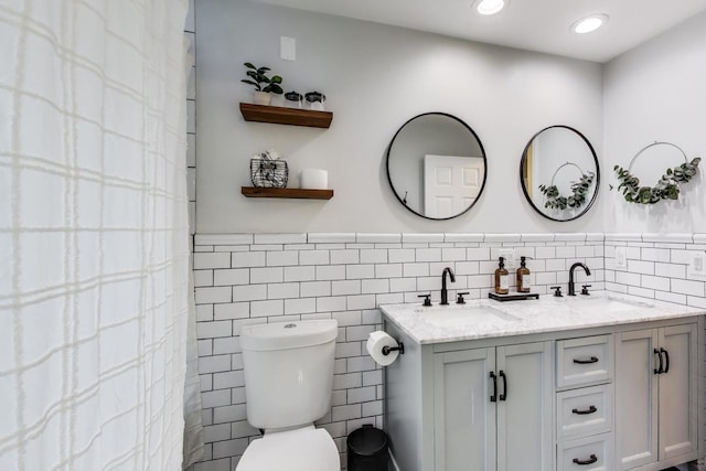 115 Circle Dr W, Montgomery, IL 60538 - bathroom with tile walls and double vanity