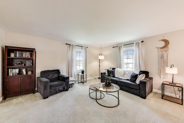 115 Circle Dr W, Montgomery, IL 60538 - living area with light colored carpet and baseboards