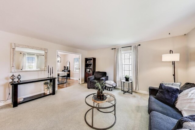 115 Circle Dr W, Montgomery, IL 60538 - living room with light colored carpet and healthy amount of natural light
