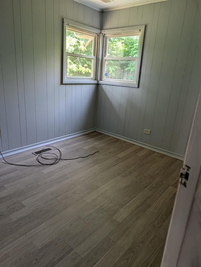 10 Apache St, Park Forest, IL 60466 - spare room featuring wood finished floors and baseboards