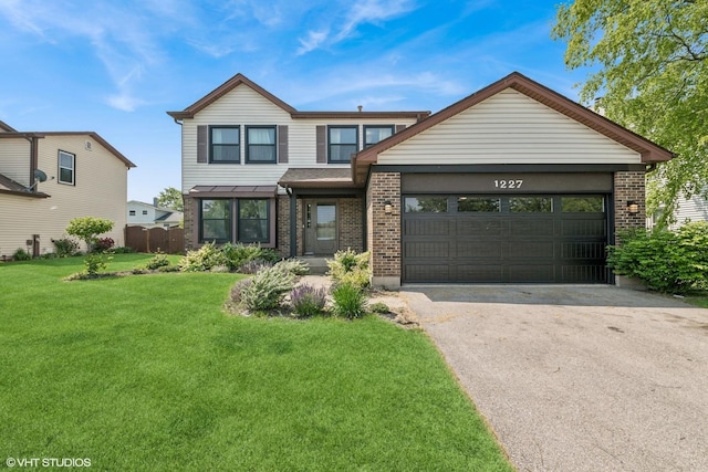 1227 Timber Dr, Elk Grove Village, IL 60007 - view of front of property with brick siding, asphalt driveway, a front lawn, and an attached garage