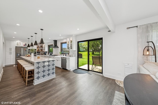 1227 Timber Dr, Elk Grove Village, IL 60007 - kitchen with appliances with stainless steel finishes, dark wood-style flooring, light countertops, glass insert cabinets, and white cabinetry