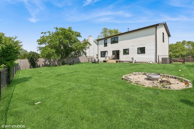 1227 Timber Dr, Elk Grove Village, IL 60007 - back of house featuring a fenced backyard and a fire pit