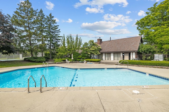 491 Timber Ridge Dr Unit 104, Carol Stream, IL 60188 - community pool featuring a patio