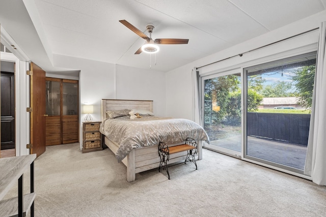 491 Timber Ridge Dr Unit 104, Carol Stream, IL 60188 - bedroom featuring access to exterior, light colored carpet, and ceiling fan