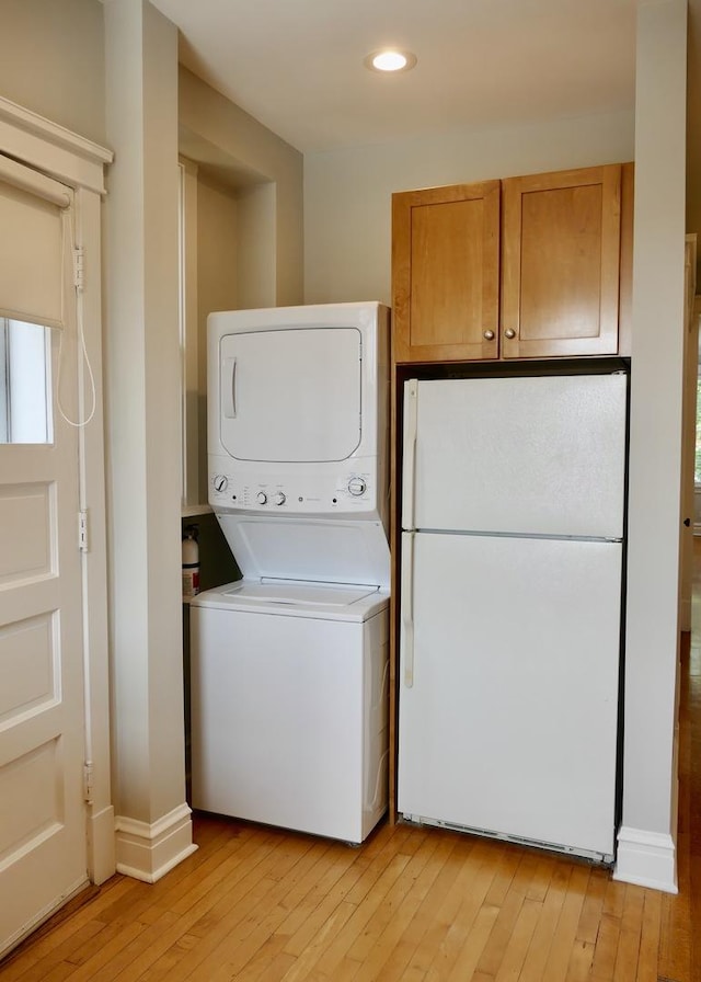 1961 W Winona Ave Unit 3, Chicago, IL 60640 - washroom featuring stacked washer / drying machine, light wood-type flooring, and recessed lighting