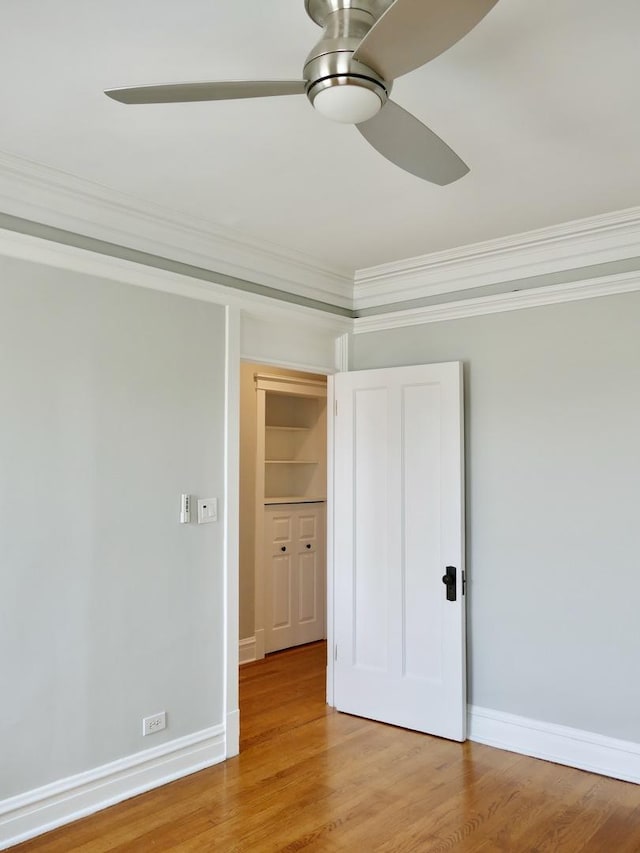 1961 W Winona Ave Unit 3, Chicago, IL 60640 - unfurnished bedroom featuring crown molding, light wood-style flooring, and ceiling fan