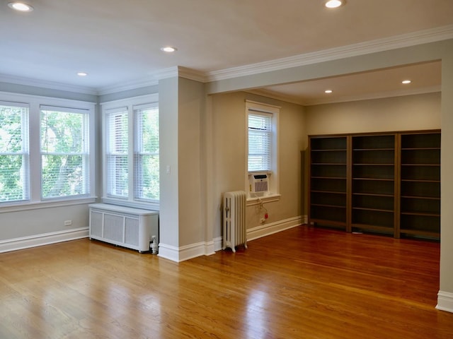 1961 W Winona Ave Unit 3, Chicago, IL 60640 - empty room featuring radiator heating unit, plenty of natural light, recessed lighting, and crown molding
