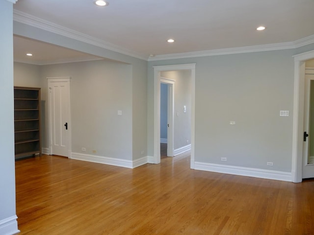1961 W Winona Ave Unit 3, Chicago, IL 60640 - spare room featuring light wood finished floors, ornamental molding, and recessed lighting