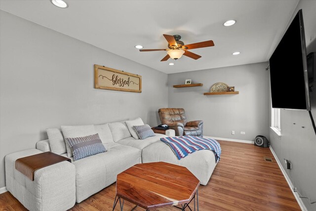 2680 Jenna Cir, Montgomery, IL 60538 - living area featuring a ceiling fan, recessed lighting, and wood finished floors