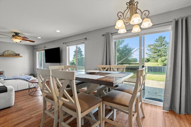 2680 Jenna Cir, Montgomery, IL 60538 - dining area with a chandelier, light wood finished floors, recessed lighting, and ceiling fan