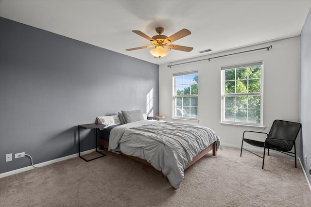2680 Jenna Cir, Montgomery, IL 60538 - carpeted bedroom featuring baseboards and ceiling fan