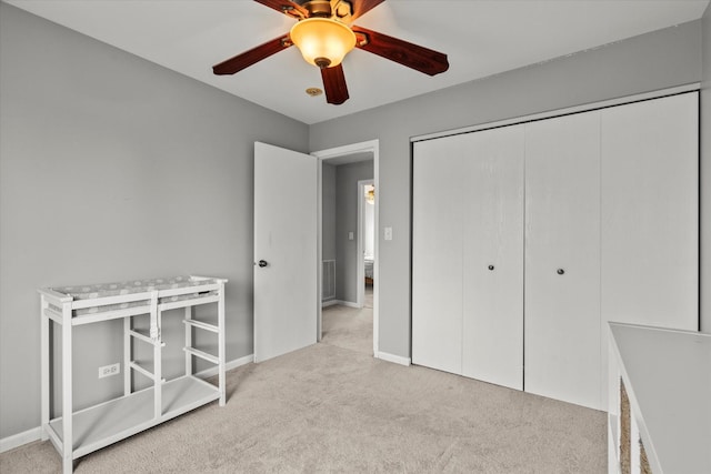2680 Jenna Cir, Montgomery, IL 60538 - unfurnished bedroom featuring carpet, a closet, and ceiling fan