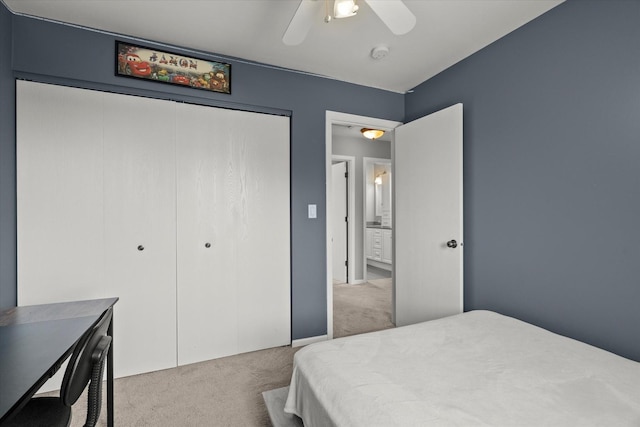 2680 Jenna Cir, Montgomery, IL 60538 - bedroom with light colored carpet, a closet, and a ceiling fan