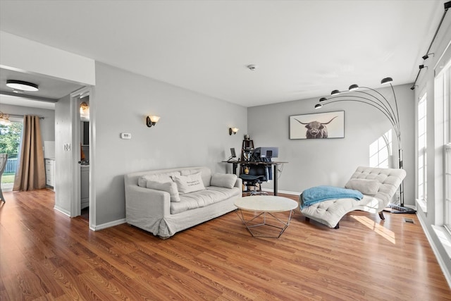 2680 Jenna Cir, Montgomery, IL 60538 - living room with wood finished floors and a desk