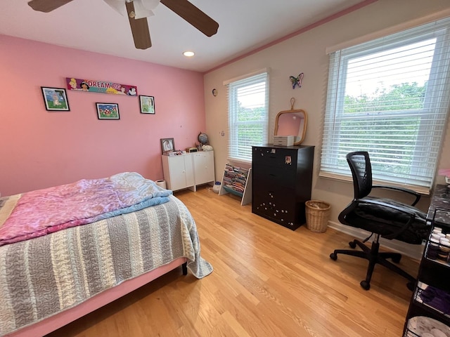 10 Chestnut Ct E, Buffalo Grove, IL 60089 - bedroom with light wood-style flooring, a ceiling fan, a desk, and recessed lighting