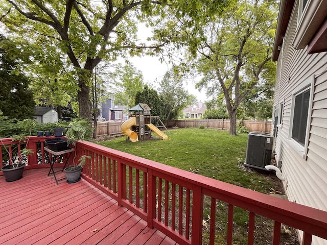 10 Chestnut Ct E, Buffalo Grove, IL 60089 - wooden terrace with a fenced backyard, a playground, and a storage shed