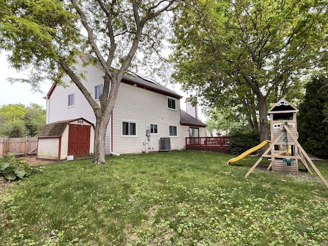 10 Chestnut Ct E, Buffalo Grove, IL 60089 - view of yard with a storage unit, a playground, and a wooden deck