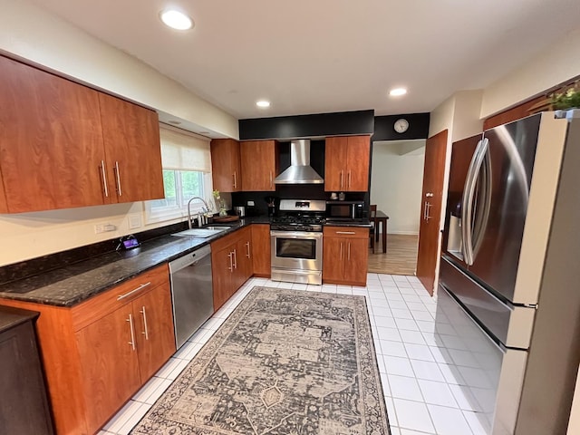 10 Chestnut Ct E, Buffalo Grove, IL 60089 - kitchen with appliances with stainless steel finishes, wall chimney range hood, light tile patterned floors, brown cabinets, and recessed lighting