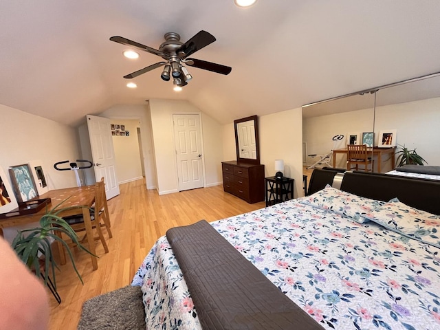 10 Chestnut Ct E, Buffalo Grove, IL 60089 - bedroom featuring light wood-style flooring, vaulted ceiling, and a ceiling fan