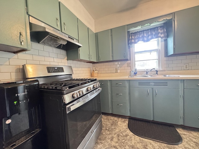 901 N Knox St, Princeton, IL 61356 - kitchen featuring gas stove, under cabinet range hood, light countertops, decorative backsplash, and green cabinets