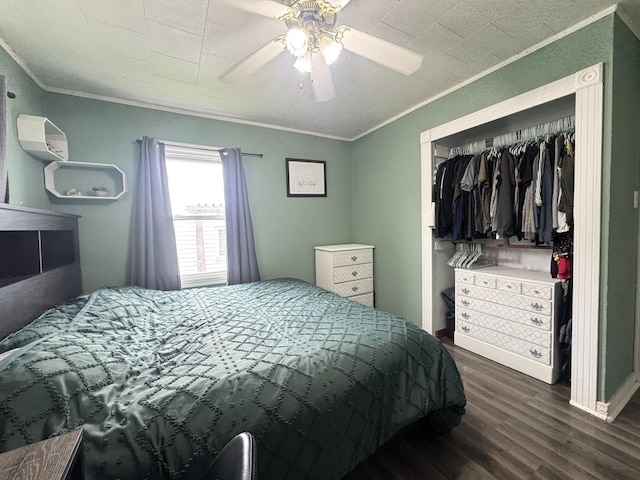 901 N Knox St, Princeton, IL 61356 - bedroom with wood finished floors, ornamental molding, a closet, and ceiling fan