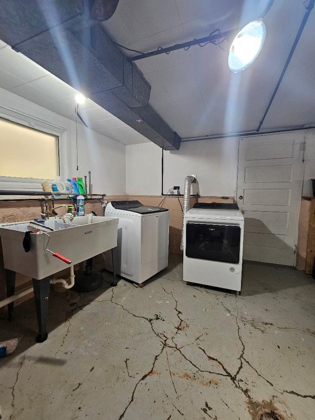 5626 N Mcvicker Ave, Chicago, IL 60646 - basement with washer and clothes dryer and a sink