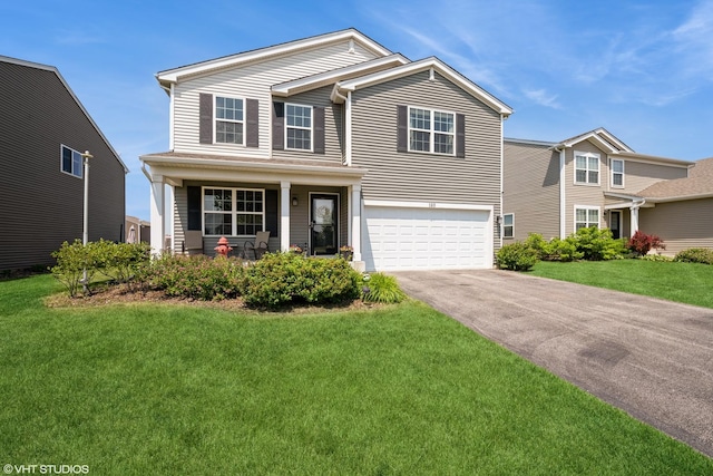 1311 Bayberry Cir, Pingree Grove, IL 60140 - traditional-style house with a porch, an attached garage, asphalt driveway, and a front lawn