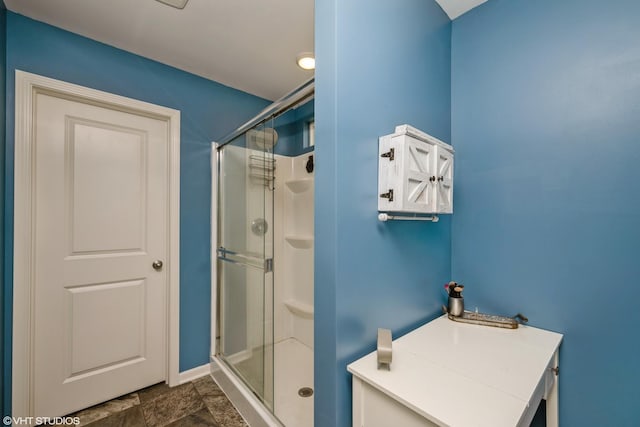 1311 Bayberry Cir, Pingree Grove, IL 60140 - bathroom featuring a stall shower and stone finish floors