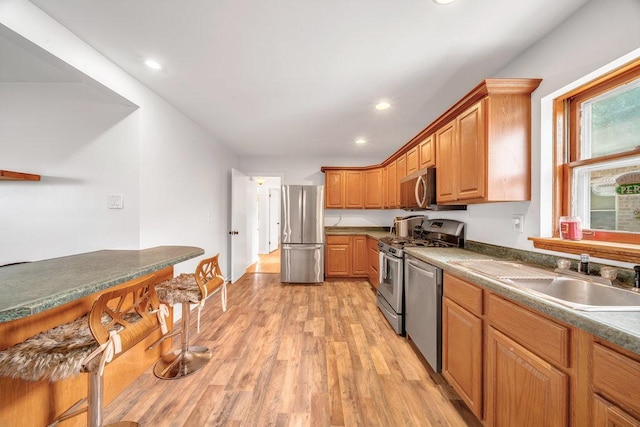 11334 S Central Park Ave, Chicago, IL 60655 - kitchen with stainless steel appliances, light wood finished floors, recessed lighting, and dark countertops