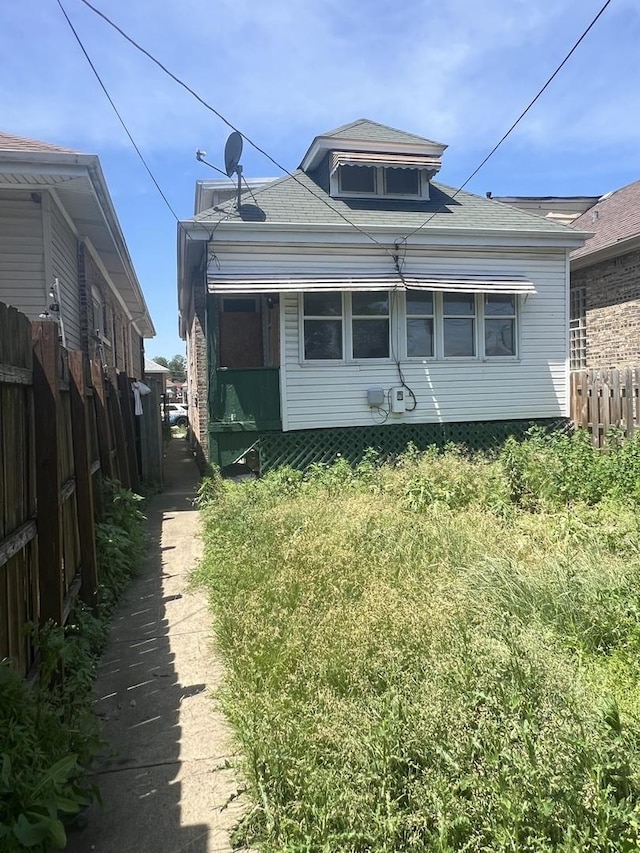 8723 S Hermitage Ave, Chicago, IL 60620 - view of front of property with a shingled roof