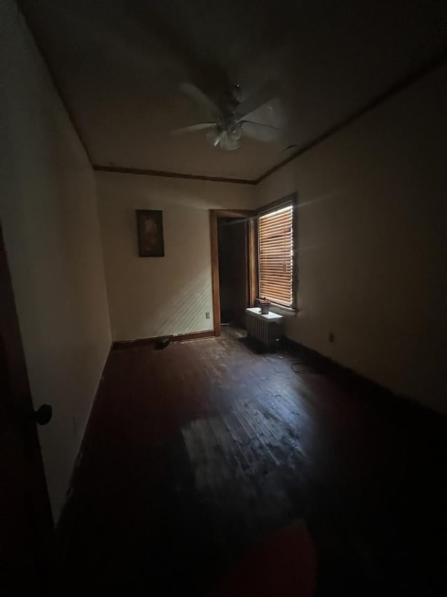 8723 S Hermitage Ave, Chicago, IL 60620 - unfurnished bedroom featuring wood finished floors and a ceiling fan