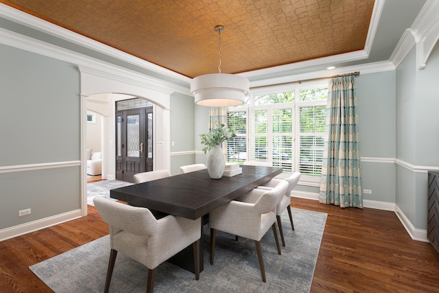 1046 Sylvan Cir, Naperville, IL 60540 - dining space with a raised ceiling, crown molding, dark wood finished floors, and arched walkways