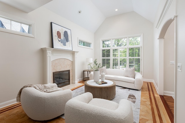 1046 Sylvan Cir, Naperville, IL 60540 - living area featuring plenty of natural light, a premium fireplace, high vaulted ceiling, and recessed lighting