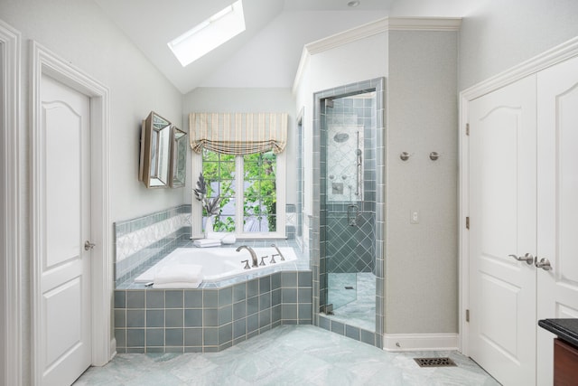 1046 Sylvan Cir, Naperville, IL 60540 - full bath featuring a bath, a skylight, a shower stall, vaulted ceiling, and tile patterned flooring