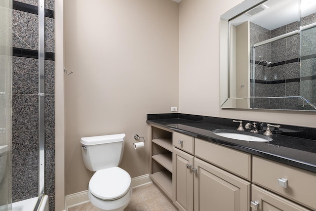 1046 Sylvan Cir, Naperville, IL 60540 - bathroom featuring vanity, a tile shower, and tile patterned floors