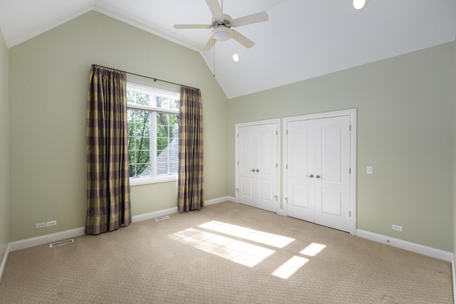 1046 Sylvan Cir, Naperville, IL 60540 - unfurnished bedroom with lofted ceiling, two closets, carpet flooring, and a ceiling fan